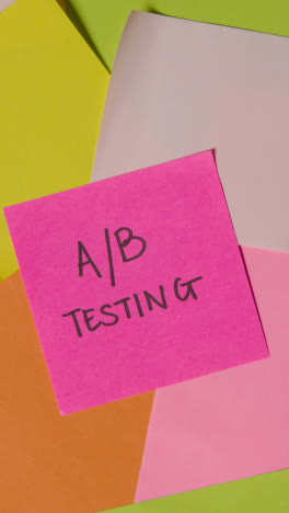 Vertical-Video-Business-Concept-Of-Revolving-Sticky-Notes-With-A/B-Testing-Written-On-Top-Note